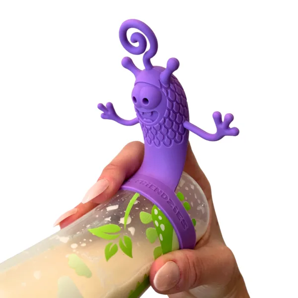 Feeding Friendzies interactive toy for baby bottles on a filled baby bottle held in a hand facing foward in purple